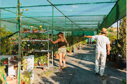 A couple of gardeners Working at, a Person Photo by Manu Reyes