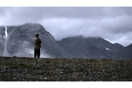 Man photographing mountain highness, a Sports & Recreation Photo by Media Whale Stock