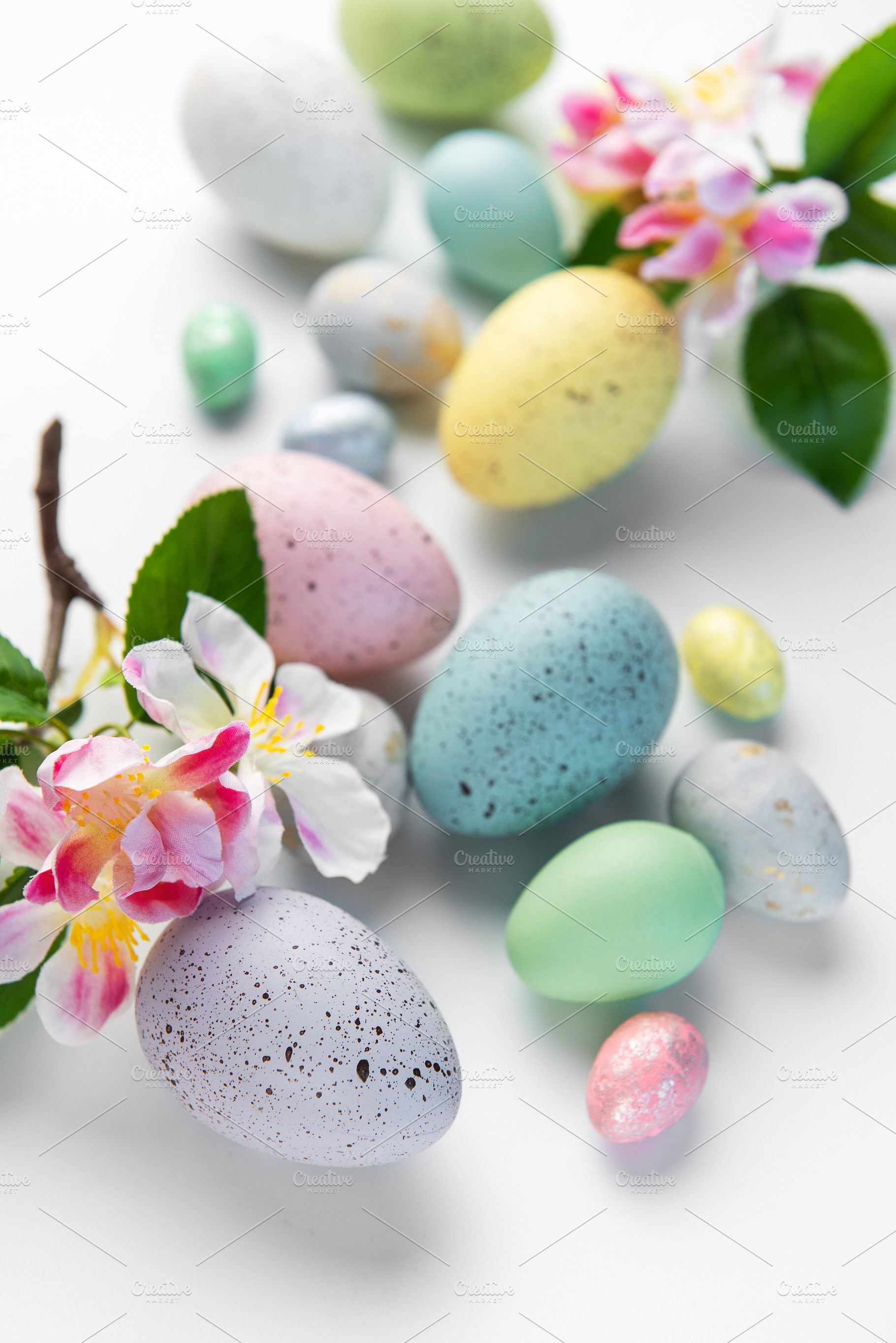 Pastel easter eggs with spring blossoms celebrating holiday seas, a Holiday Photo by Olena Rudo