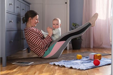 Mother with baby make yoga at home, a Sports & Recreation Photo by Koldunova