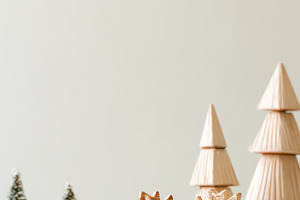 Christmas wooden reindeer in snowy winter scene with copy space