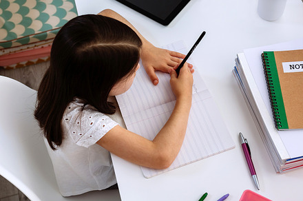Girl studying at home with tablet an containing back to school, bacteria, and, a School & Education Photo by davidpereiras