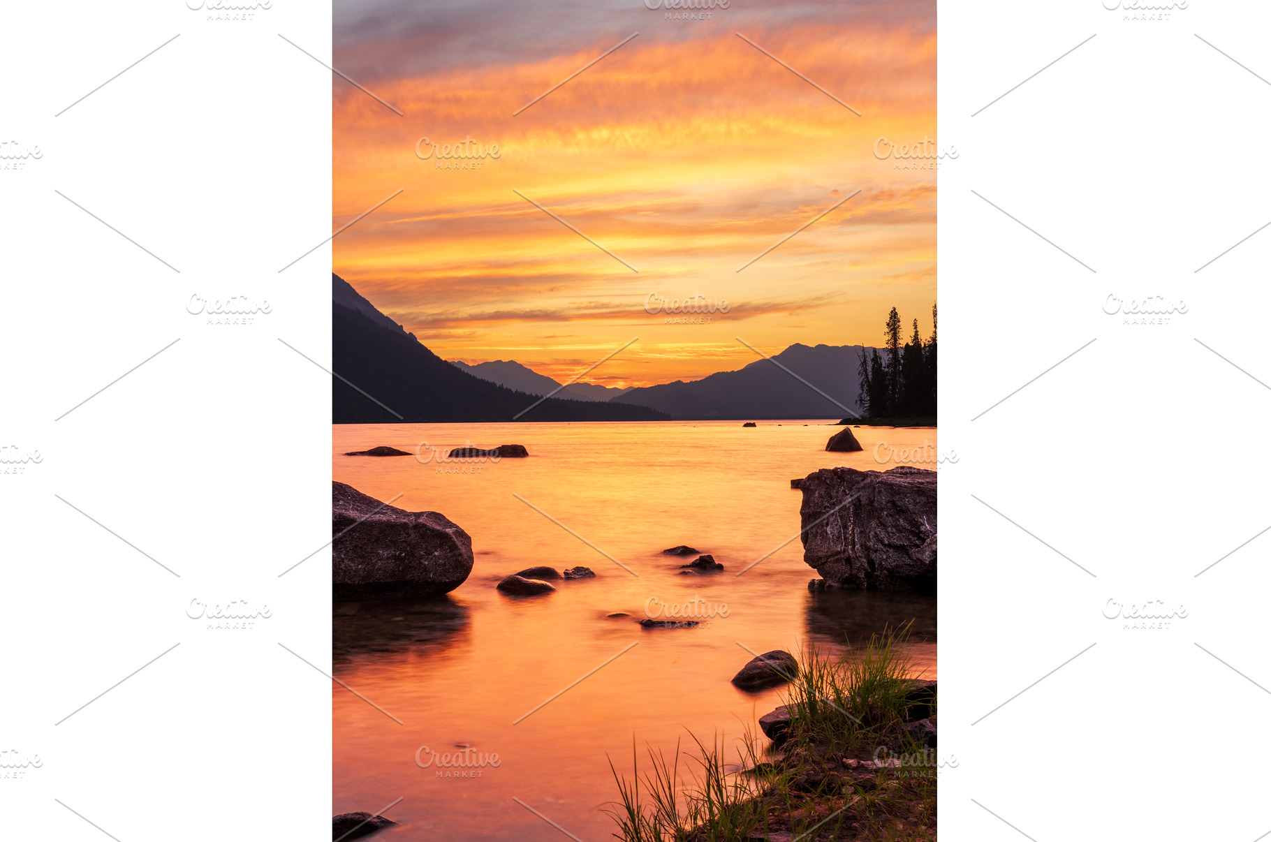 Vibrant sunset over Lake Wenatchee, a Nature Photo by Backyard Stock
