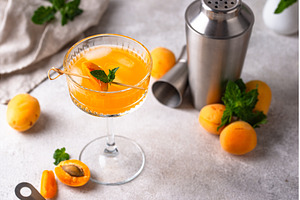 Fresh apricot Bellini cocktail with, a Food & Drink Photo by Yulia Furman