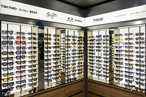 Sunglasses on display in a shop, a Health & Medical Photo by BOOCYS