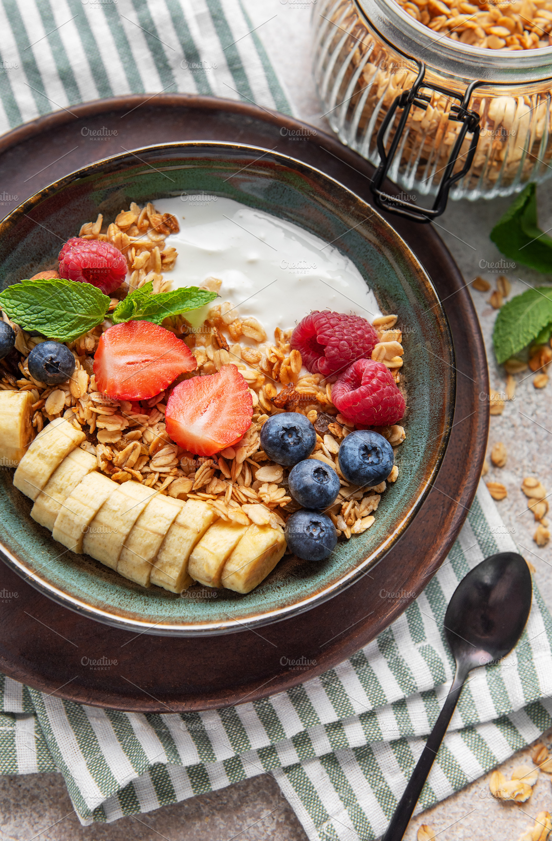 Healthy breakfast bowl with yogurt, granola, fresh berries and b, a Food & Drink Photo by Olena Rudo