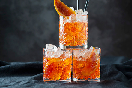 Italian traditional cocktail Aperol Spritz with orange, a Food & Drink Photo by oxana.denezhkina