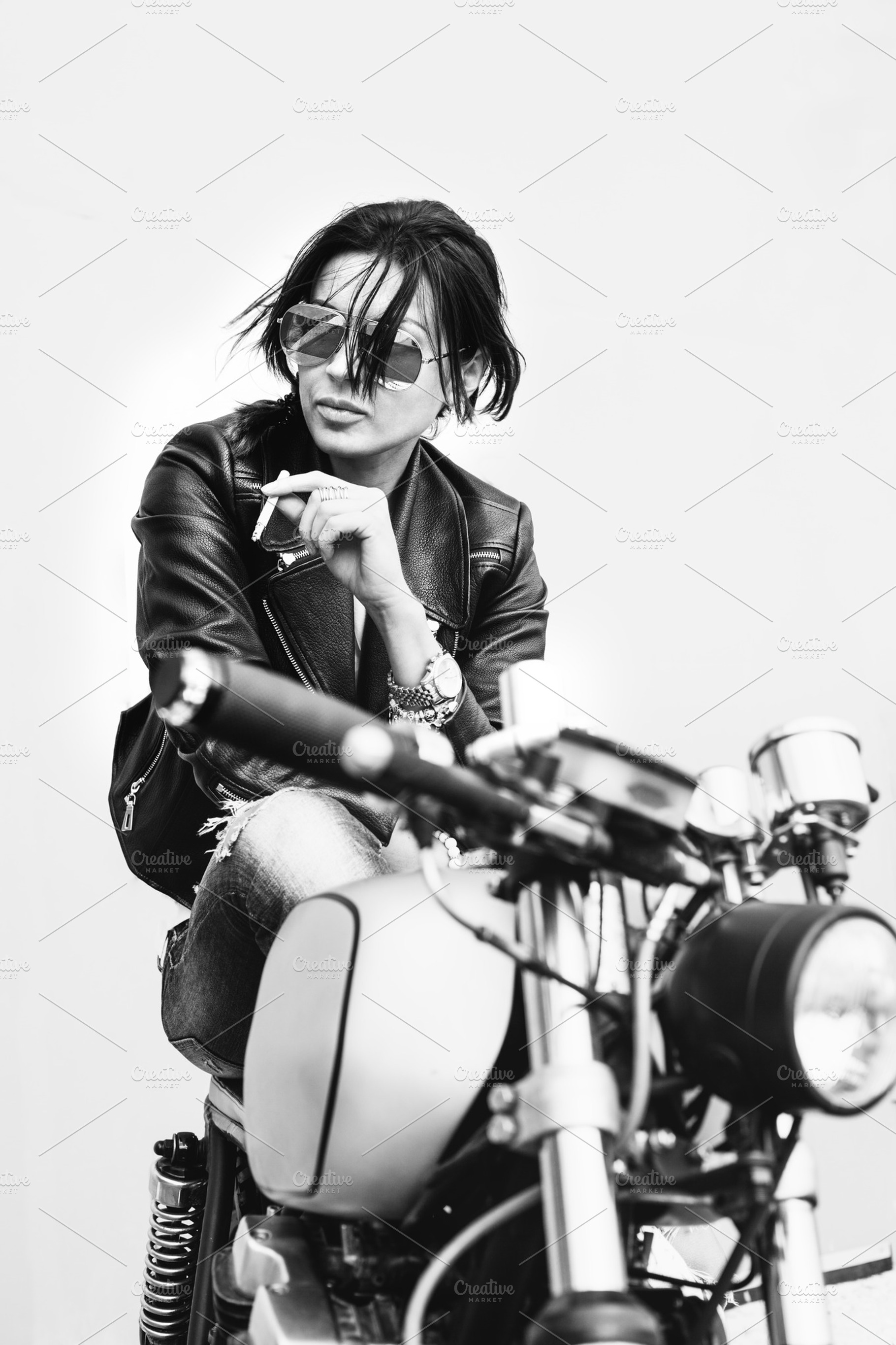 Biker woman in leather jacket on motorcycle containing girl, recast, and, a Person Photo by Aliaksei Kaponia