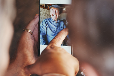 Love, memory and couple with phone picture to remember romantic date, bond and relax quality time together. Happy, smile and elderly man and woman view digital photo album on mobile smartphone screen, a Photo by Peopleimages.com