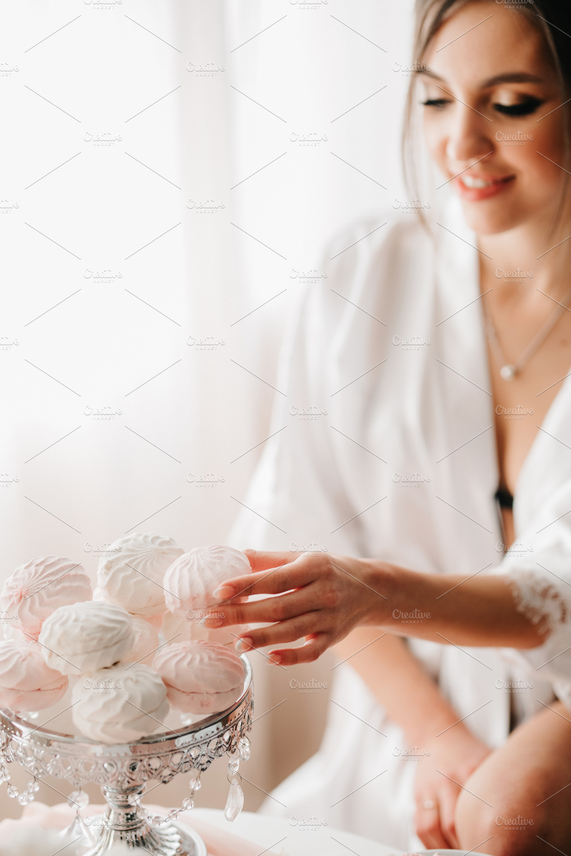 A young bride sits at a slot machine in the morning and drinks c, a Person Photo by Weddings, People, Travel