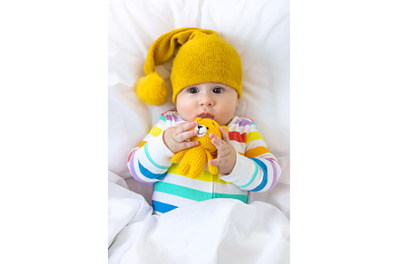 The baby in the crib goes to bed, a Person Photo by yanadjana