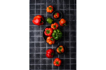 Colorful bell pepper on black, a Food & Drink Photo by Yulia Furman