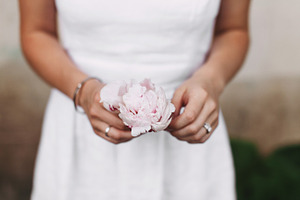 Pink peony containing pink, peony, and young woman