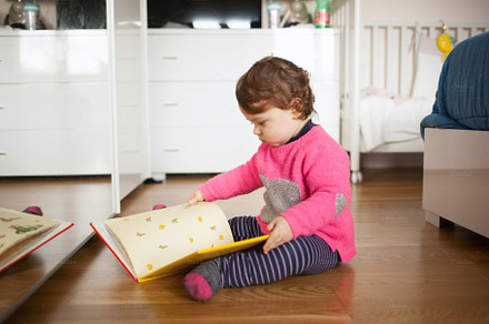 Toddler baby girl playing with fairy