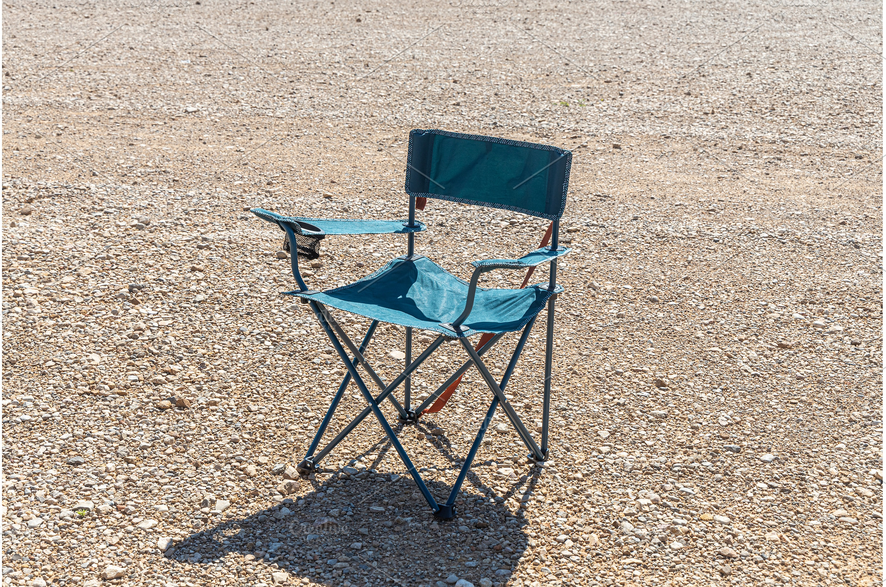 A Foldable camping chair on the, a Nature Photo by Illustrations&photos