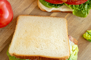 Homemade BLT (Bacon Lettuce Tomato) Sandwich with Mayo, top view