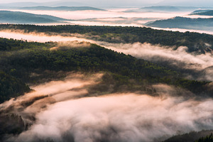 Morning fog in the mountains at dawn