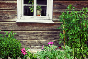 Window of an old log house, an Architecture Photo by BOOCYS