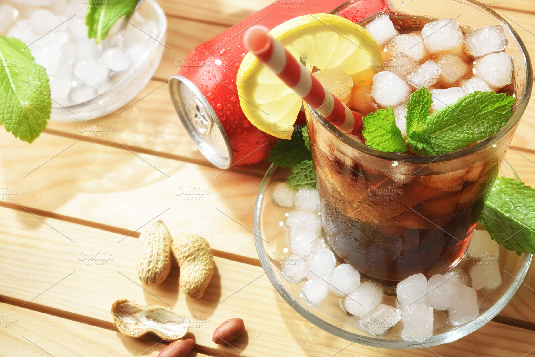 Cola soda on wooden table with appetizers on sunny day, a Food & Drink Photo by Davizro's Market