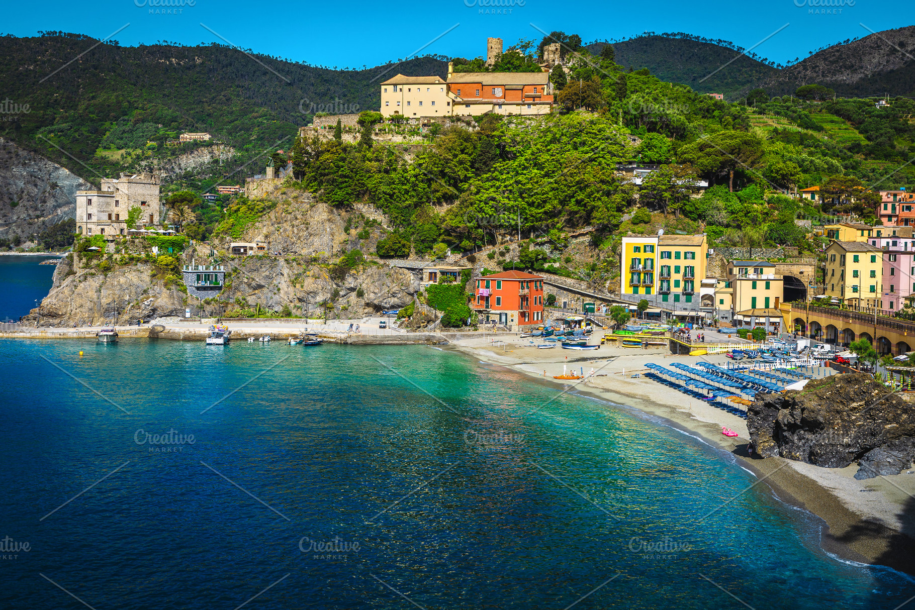 Ligurian beach and colorful houses, an Architecture Photo by Alpine Dreams