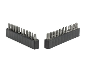 Screwdriver bit set close-up, white, an Industrial Photo by AlexBush