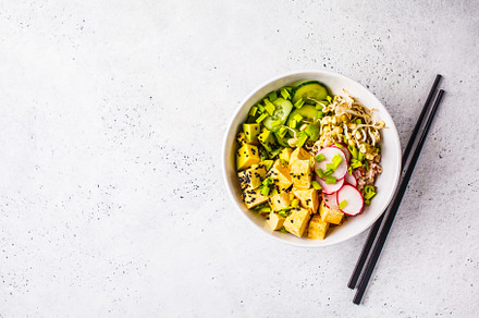 Vegan poke bowl with tofu and rice featuring asian, avocado, and background, a Food & Drink Photo by vaaseenaa