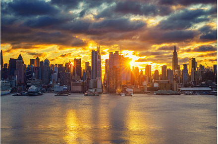 Bright sunrise over Manhattan, NY, an Architecture Photo by sborisov
