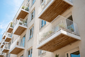 Modern Apartment Building with Wooden Balconies, an Architecture Photo by AlyaAnd