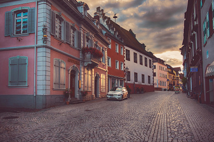 Sunset in endingen german town stock photo containing rain and church, an Architecture Photo by ariadna de raadt