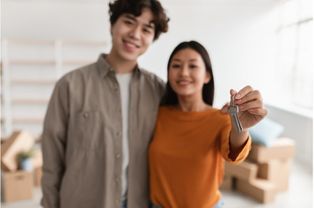 Happy Asian couple showing house key, a Person Photo by Prostock-Studio