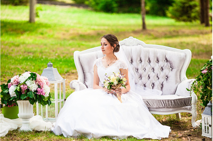 Bride sitting at the sofa in the, a Person Photo by oksix