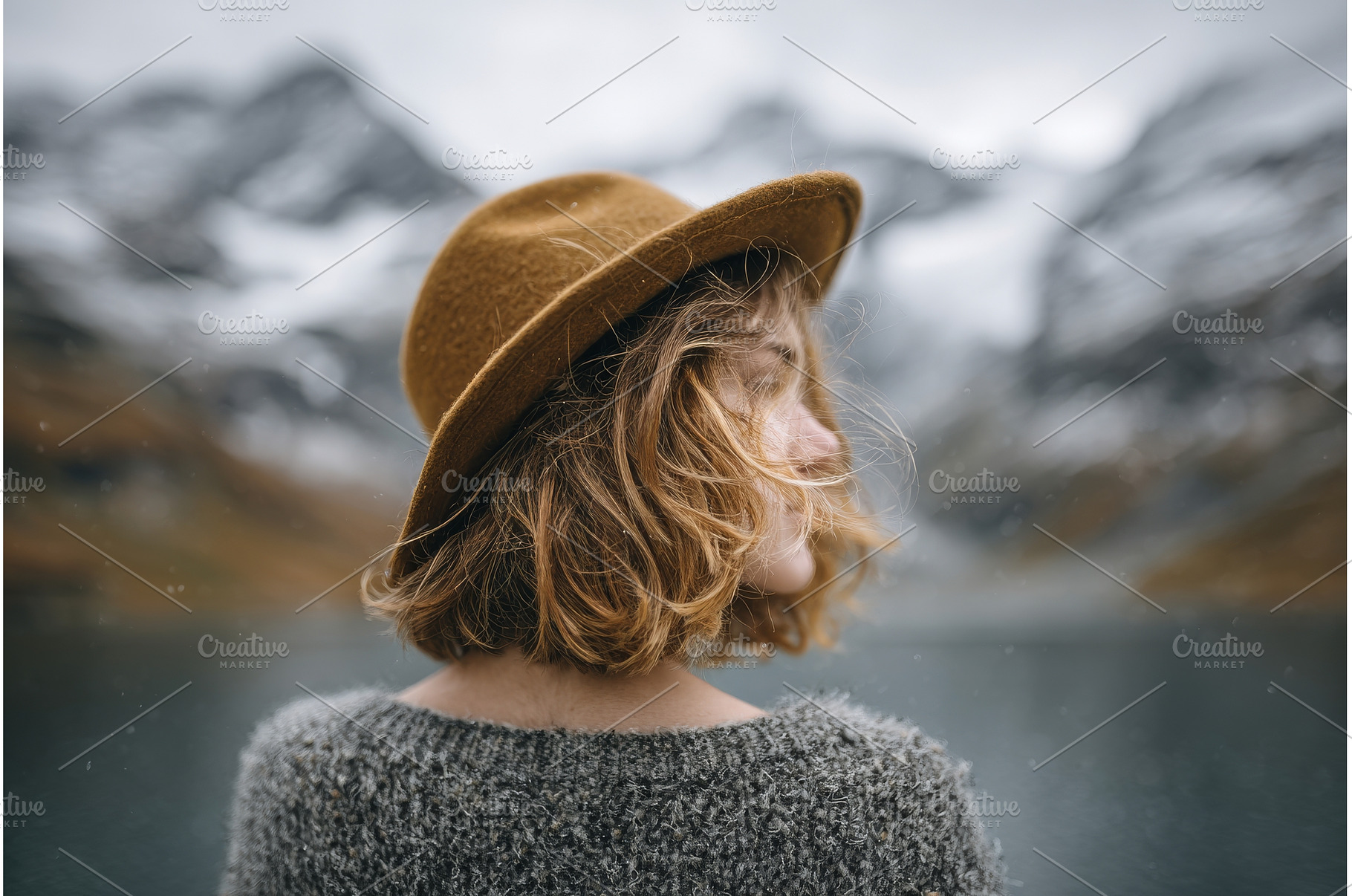 A woman is standing at the lakeside, a Person Photo by ZinetroN
