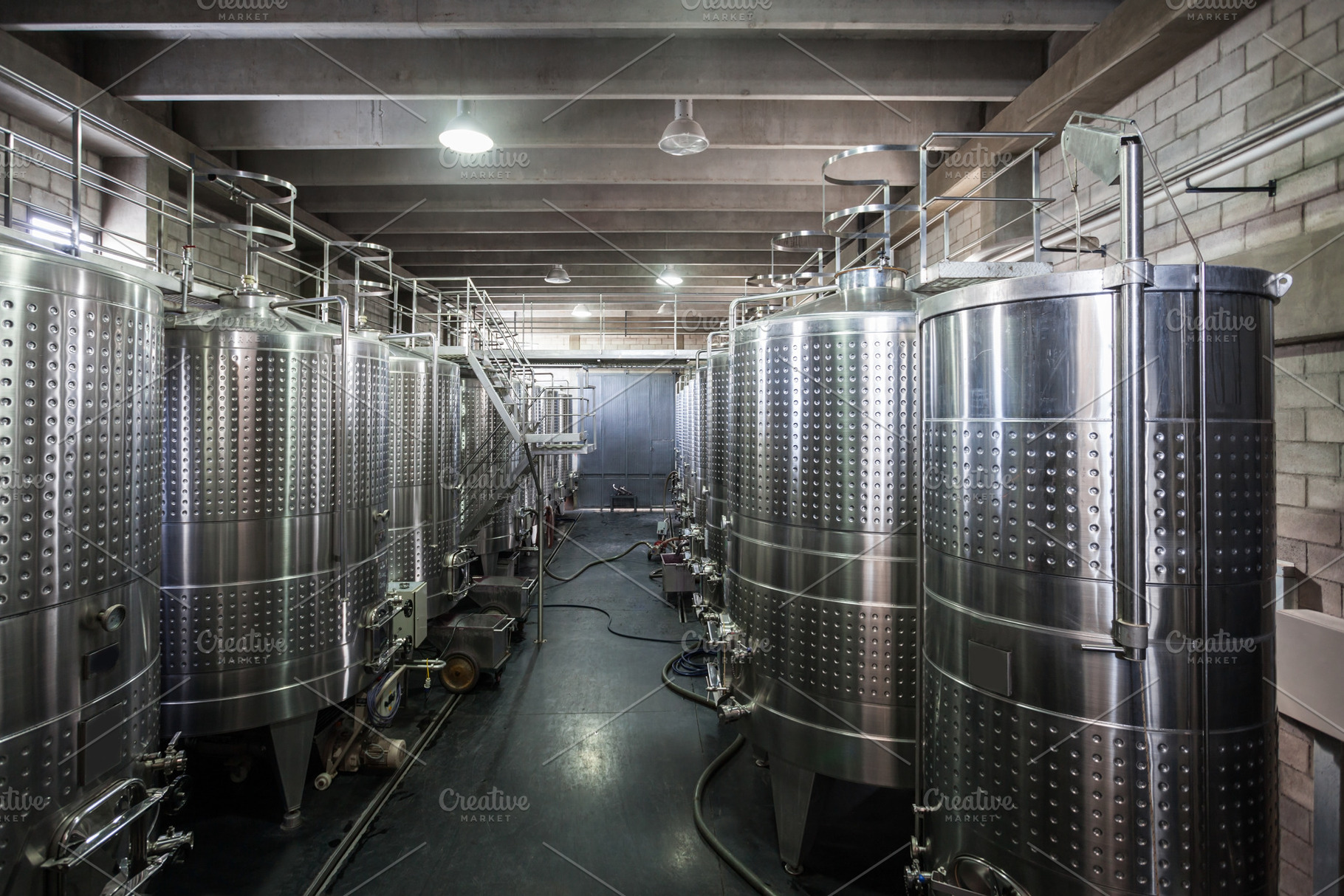 Wine Fermenting in vats, a Photo by saiko3p