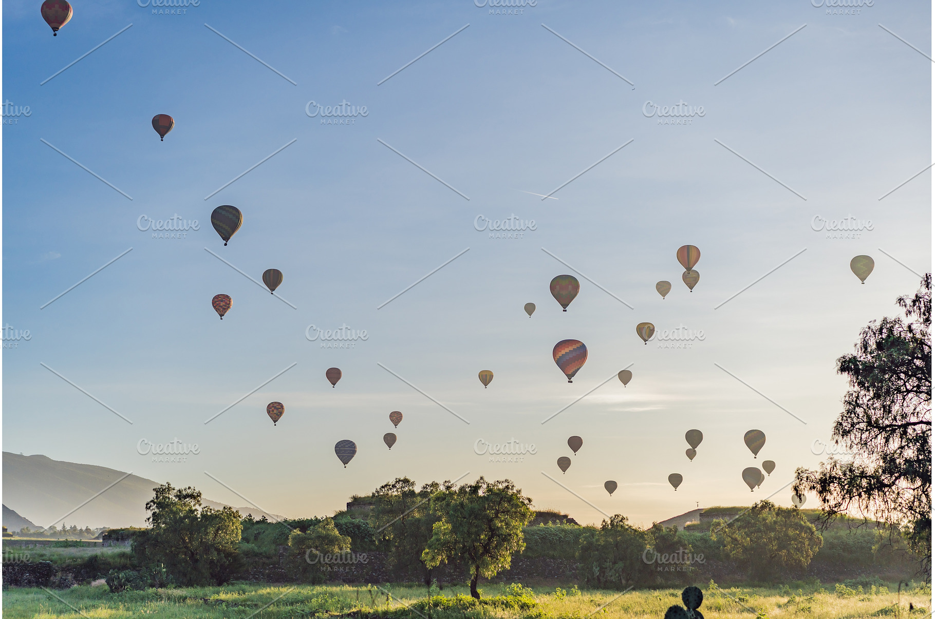 Colorful hot air balloons floating, a Sports & Recreation Photo by Elizaveta Galitskaya
