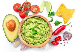 Guacamole and guacamole sauce ingredients isolated on white back, a Food & Drink Photo by Volff