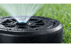 In a close-up view, a lawn sprinkler, a Nature Photo by ZinetroN
