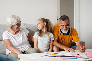 Grandparents spending time with granddaughter, a Person Photo by etorres69