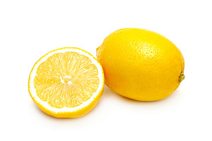 Two lemons isolated, a Photo by saiko3p