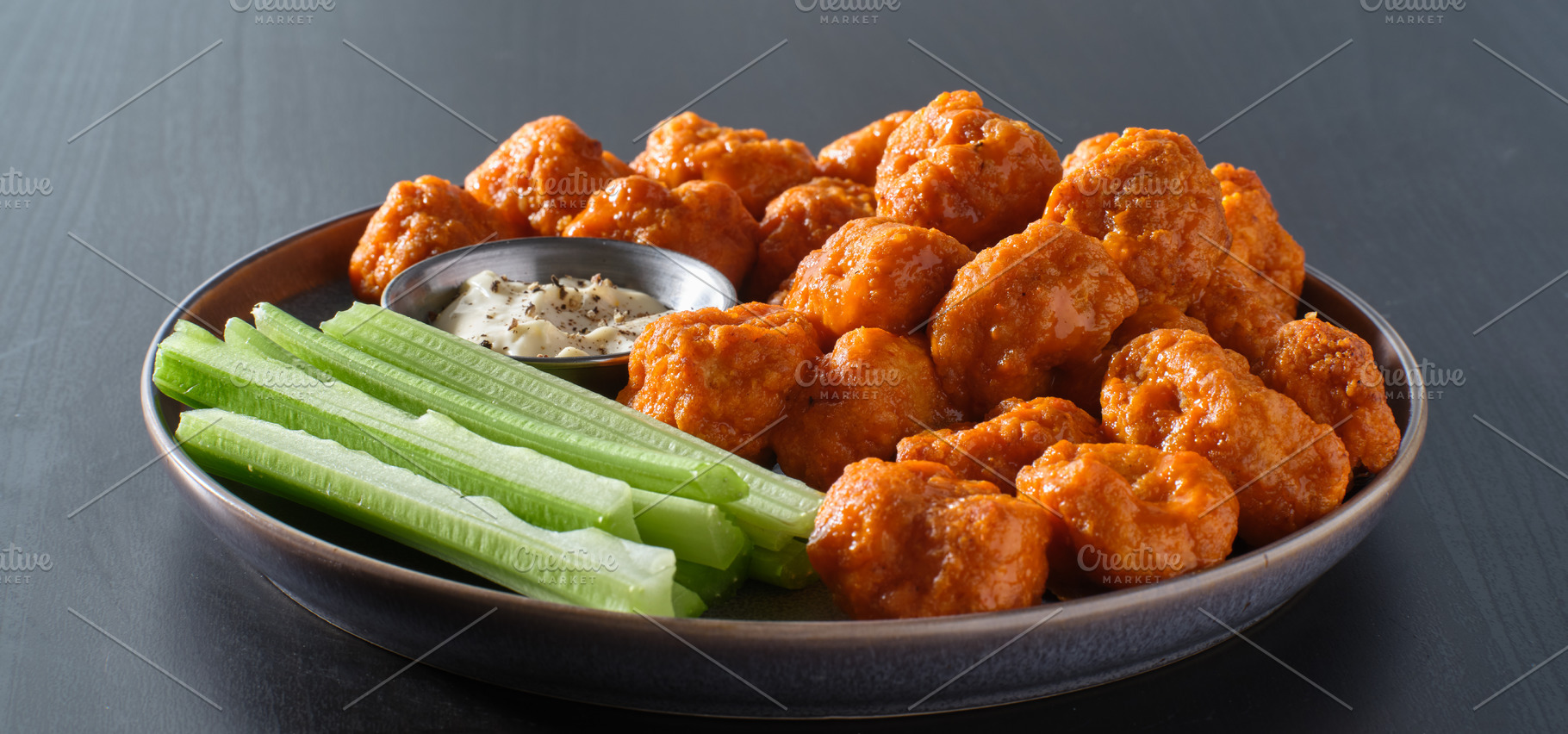 Boneless buffalo chicken wings featuring food, chicken, and nuggets, a Food & Drink Photo by RezArt