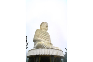 Colossal sitting buddha statue at ba containing buddha, vietnam, and statue, an Architecture Photo by Leonid Andronov