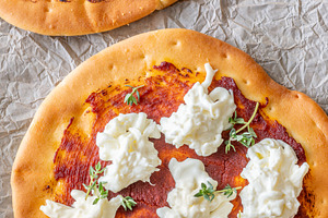 Mini pizzas baked with tomato sauce,, a Food & Drink Photo by Alexander Prokopenko