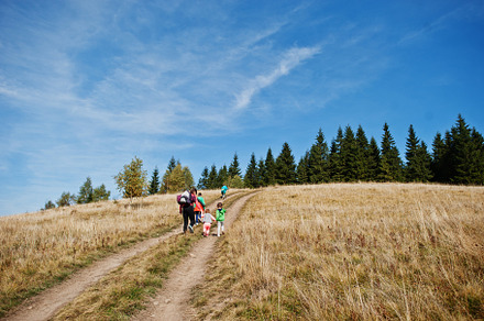 Woman is traveling with a childrens. Mom in the mountains. Climb, a Person Photo by AS photostudio