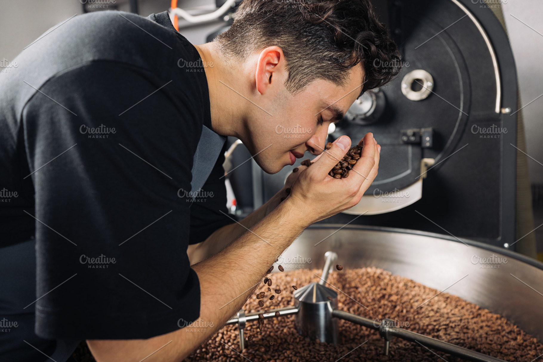 Side view of young worker smelling, a Food & Drink Photo by Artem Varnitsin