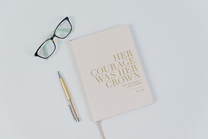 Glasses & notebook featuring 2019, branding, and february