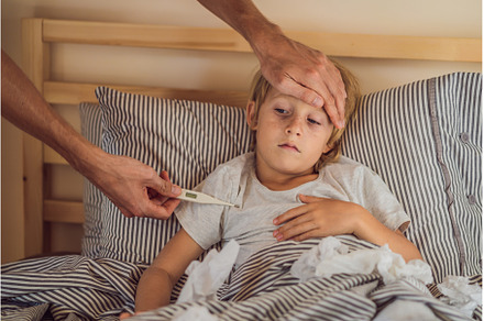 Sick boy with thermometer laying in, a Person Photo by Elizaveta Galitskaya