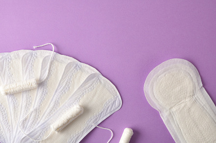 Feminine menstrual tampon and pads pack on lilac background top, a Health & Medical Photo by Davizro's Market