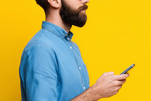 Side profile of a bearded man wear, a Technology Photo by MistyDay