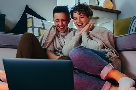 Enjoying the best online shows together, a Person Photo by Jacob Lund