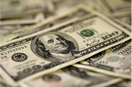 Pile of one hundred dollar bills, a Business Photo by Ylivdesign
