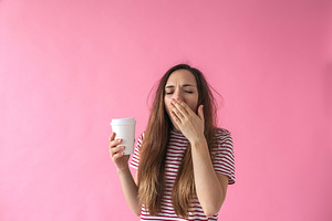 Girl with coffee is yawning featuring coffee, yawning, and tired